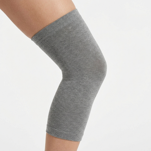 Nexova bamboo knee sleeve worn on the knee — side view