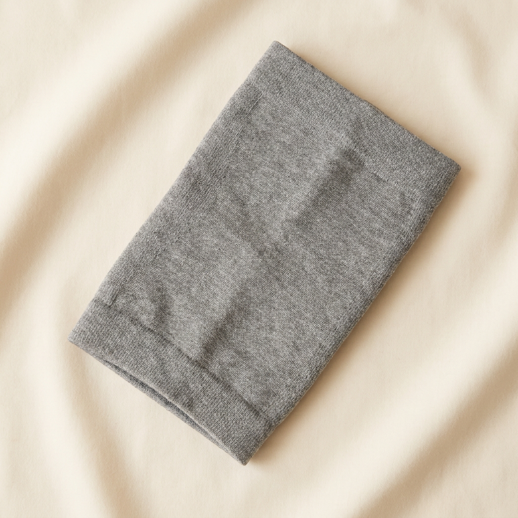 Nexova bamboo knee sleeve — folded flat lay