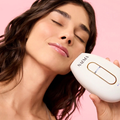 Woman using Naema IPL on her face